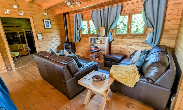 Mam cabin living room log burner view to bunk room